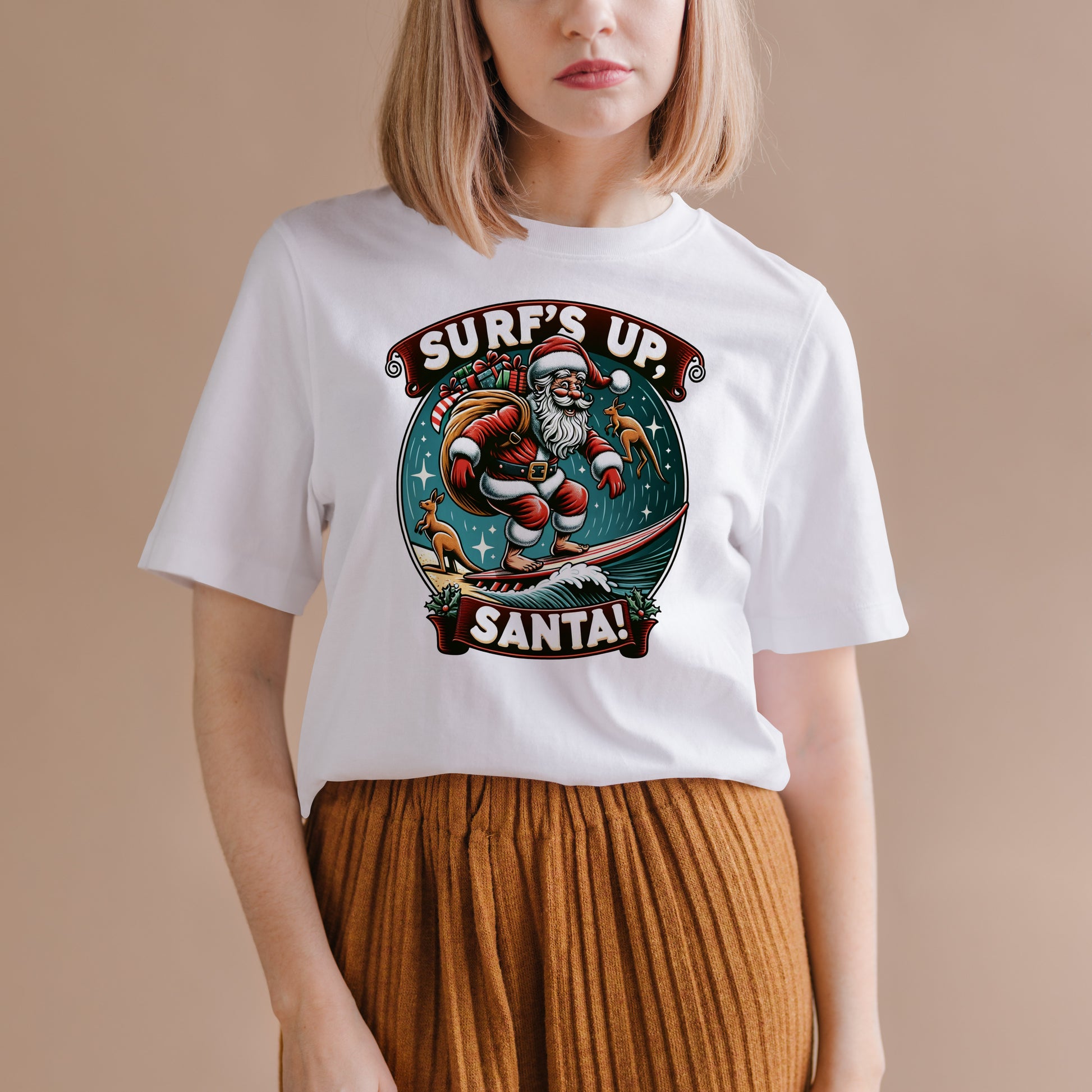A photo of a tshirt with a print of Santa surfing with Kangaroos in the background